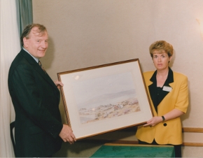 member of Albert Reynolds cabinet presented with Hamilton Sloan painting by Carlingford Heritage Centre