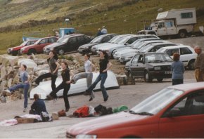girls performing irish dancing on the pier while waiting for boat to tory island