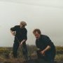 two irish men in donegal carrying on the irish tradition of turf cutting each year
